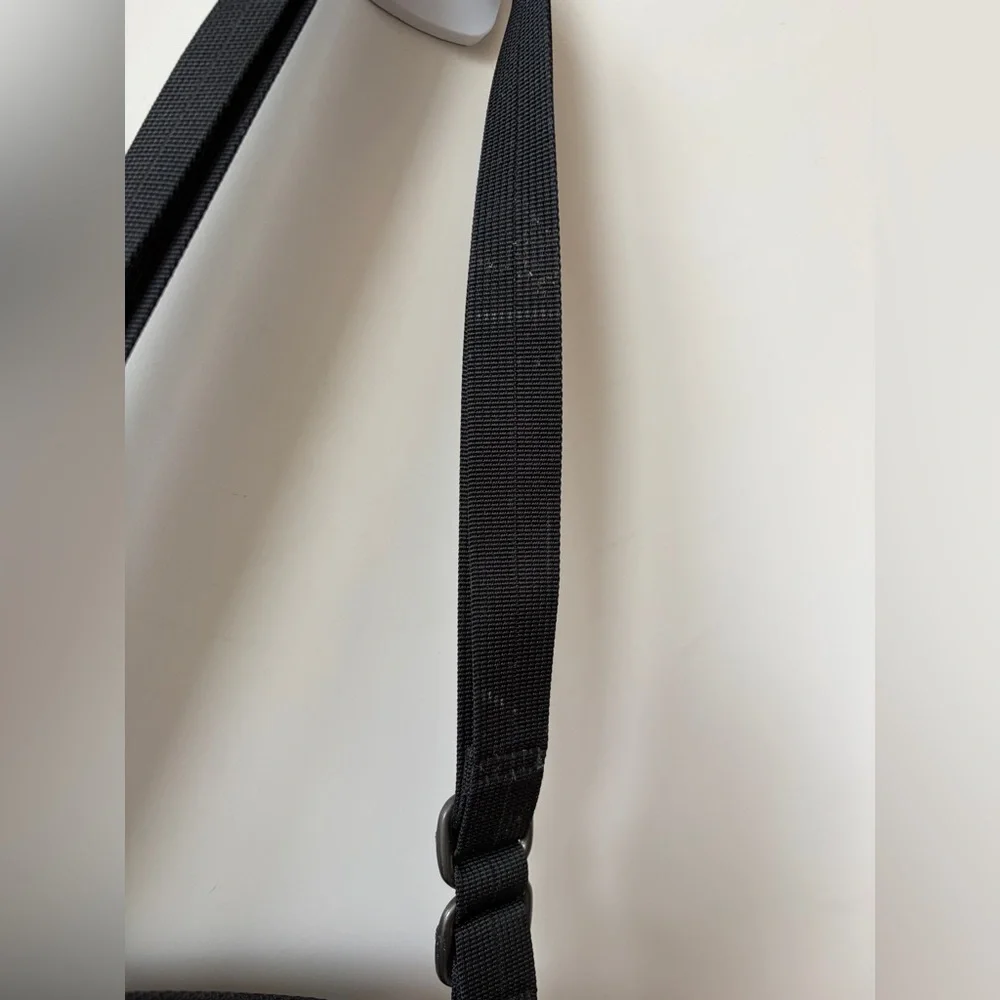Tumi T-Tech sling bag with multiple compartments and Keychain mens